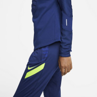Pull Nike Therma-Fit Strike pour femme en jersey bleu jaune