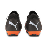 Puma Future 6.4 Chaussures de foot en gazon synthétique pour enfant Noir/blanc/orange