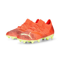 PUMA FUTURE 2.4 Gazon Naturel Gazon Artificiel Chaussures de Foot (MG) Enfants Orange Noir