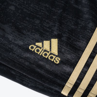 Short de football adidas noir et doré