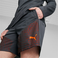 PUMA Manchester City Short d'Entraînement 2023-2024 Gris Foncé Rouge Orange