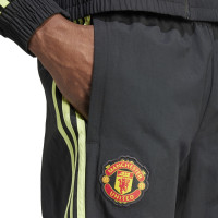 adidas Manchester United Woven Pantalon d'Entraînement 2023-2024 Noir Vert Foncé Vert Vif