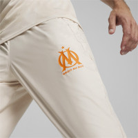 PUMA Olympique Marseille Pre-Match Woven Pantalon d'Entraînement 2023-2024 Beige Orange