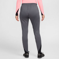 Pantalon d'entraînement Nike Strike pour femme gris rose