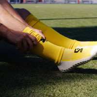 Ensemble de chaussettes et manches Robey Grip, jaune