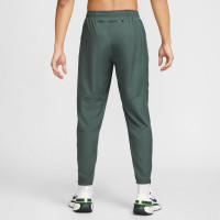 Pantalon d'entraînement tissé Nike Challenger vert noir argent