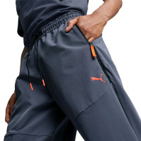PUMA Pumatech Woven Trainingsbroek Donkergrijs Oranje