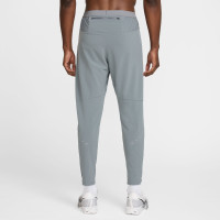 Nike Stride Trainingsbroek Woven Grijs Zilver