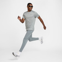 Nike Stride Trainingsbroek Woven Grijs Zilver