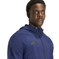 Coupe-vent adidas Tiro Travel bleu foncé noir