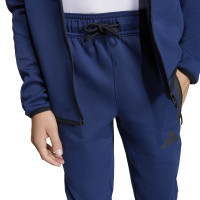 Pantalon de survêtement adidas Tiro Travel pour Enfants, bleu foncé