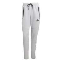 Combinaison de jogging zippée adidas Tiro Travel pour femmes, gris