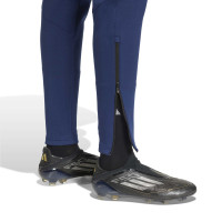 Combinaison de jogging zippée adidas Tiro Travel pour femmes, bleu foncé