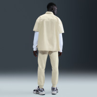Pantalon de survêtement en polaire Nike Sportswear Club beige clair blanc