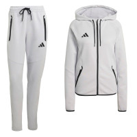 Combinaison de jogging zippée adidas Tiro Travel pour femmes, gris