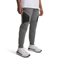 Pantalon de survêtement Unstoppable Under Armour en polaire gris foncé et noir