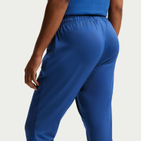 Pantalon d'entraînement Nike FC Barcelona Strike 2025-2026 pour femmes, bleu foncé, jaune vif