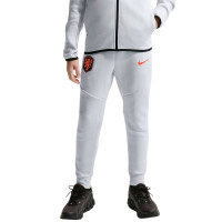 Nike Nederland Tech Fleece Trainingspak 2026-2028 Kids Lichtgrijs Zwart Feloranje