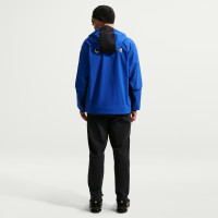 Pantalon d'entraînement tissé Nike Chelsea Tech 2026-2027 bleu foncé jaune doré