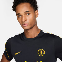 Chemise d'entraînement Nike Chelsea Strike 2026-2027 bleu foncé jaune doré
