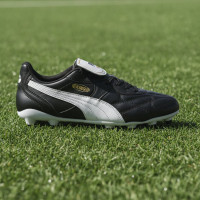 PUMA King Top Gras / Kunstgras Voetbalschoenen (MG) Zwart Goud Wit