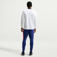 Pantalon d'entraînement Nike Paris Saint-Germain Strike 2026-2027 bleu foncé rouge vif
