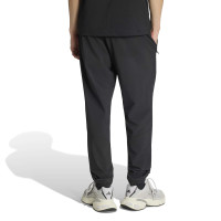 adidas Tech Trefoil Essential Woven Trainingsbroek Zwart Zilver