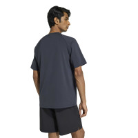 adidas Tech Essential Woven Zomerset Donkergrijs Zilver