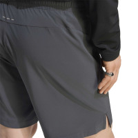 adidas Tech Essential Woven Zomerset Donkergrijs Zilver