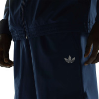adidas Tech Essential Woven Zomerset Donkerblauw Zilver