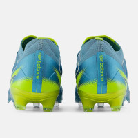 New Balance Tekela V5 Elite Low Gazon Naturel Chaussures de Foot (FG) Bleu Métallique Jaune