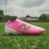 New Balance Tekela V5 Elite Low Gazon Naturel Chaussures de Foot (FG) Rose Vif Blanc Doré