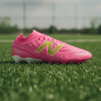 New Balance Tekela V5 Team Low Gras Voetbalschoenen (FG) Felroze Wit Goud