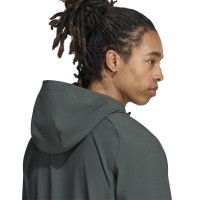 Veste d'entraînement adidas Manchester United Tiro Travel 2026-2027 Vert olive foncé, blanc, rouge